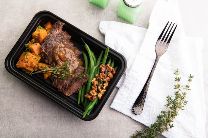 Filet Mignon with Rosemary. Served with Roasted Sweet Potatoes and sided with Green Beans and Walnuts.